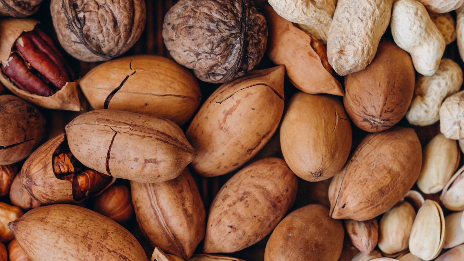 Assorted mixed nuts including cashews and almonds, ideal for an office snack drawer